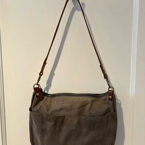 Grey waxed canvas cross body bag with shoulder strap